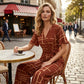 Női elegáns, kötényes stílusú jumpsuit övvel