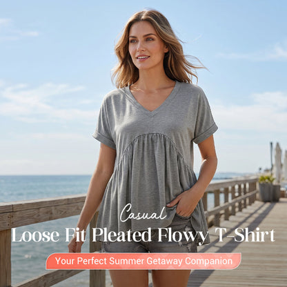 Laza, bő szabású, redőzött, folyós anyagú póló