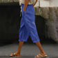 Női alkalmi capri nadrág oldalsó gombokkal
