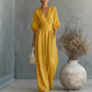 Női V-nyakú, magas derekú, széles szárú jumpsuit