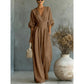 Női V-nyakú, magas derekú, széles szárú jumpsuit