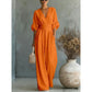 Női V-nyakú, magas derekú, széles szárú jumpsuit