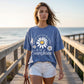 🌼 2026-os akció – Több mint 78 000 eladva!🔥Uniszex vintage mosott margarétás nyomatú bő szabású póló